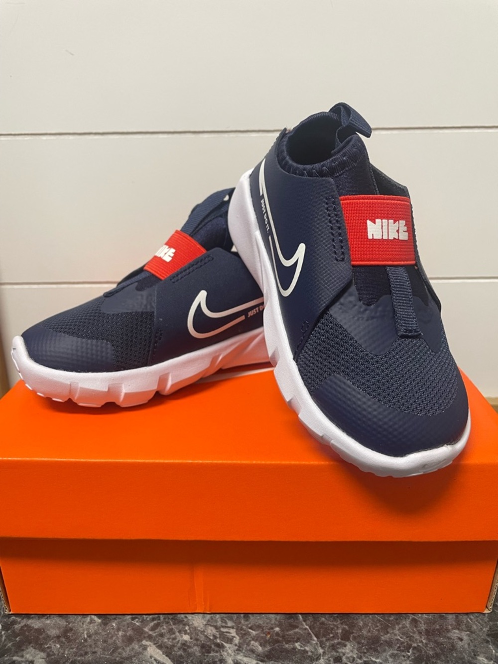 Nike Kids Navy, Red and White Slip-On Athletic Sneakers